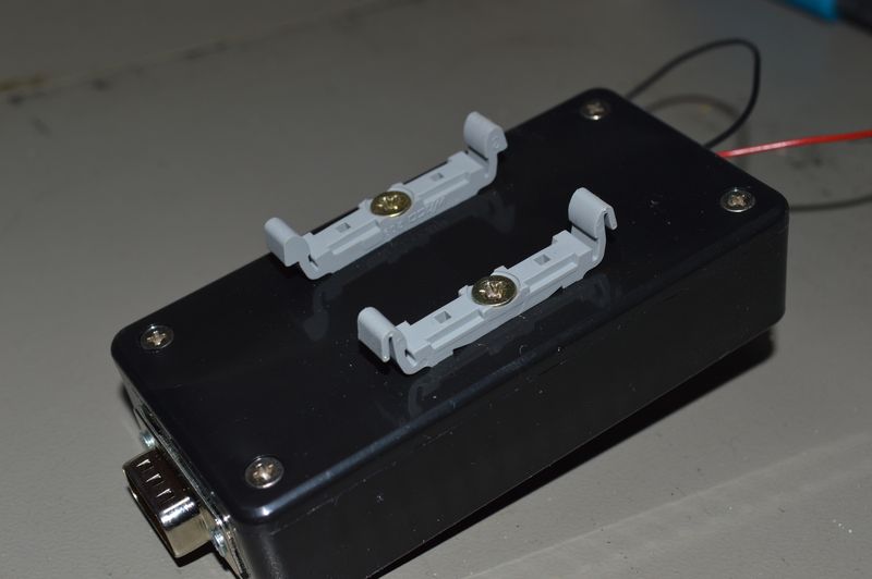 DIN rail brackets on the back of the module