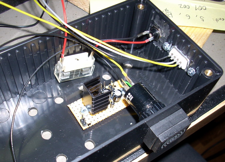 Voltage regulator with heat-sink