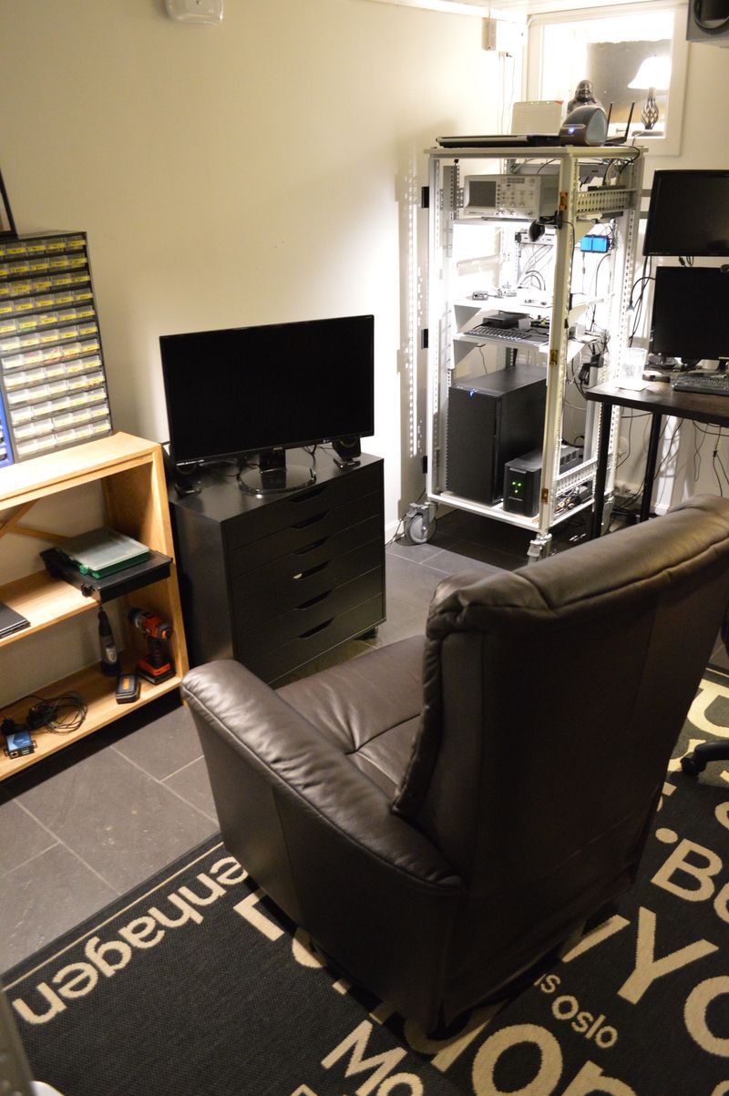 Man cave with recliner, TV and computer rack