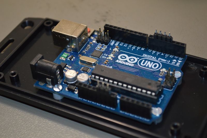 Arduino UNO board mounted to plastic enclosure lid