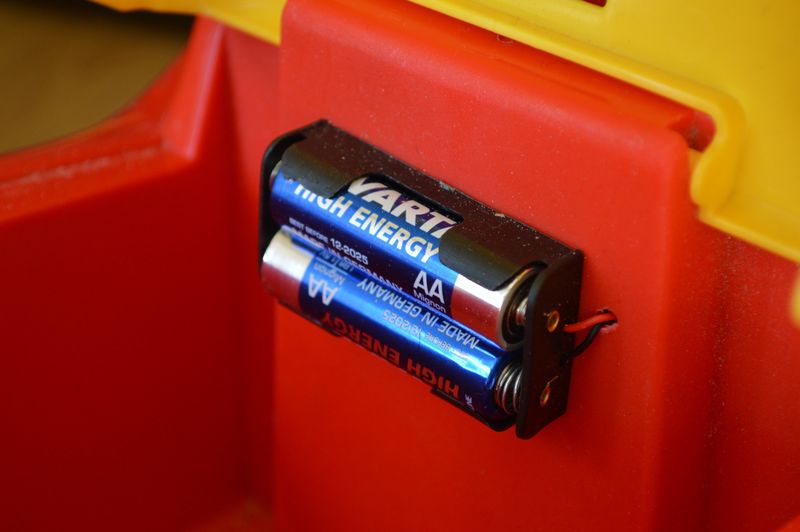 Batteries in storage compartment under the seat
