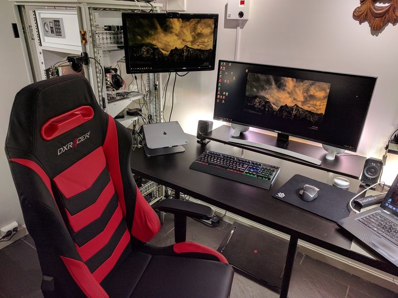 Computer desk with ultrawide monitor and DXracer chair