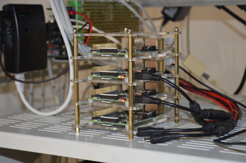 Stacked Raspberry Pi boards, with common power supply