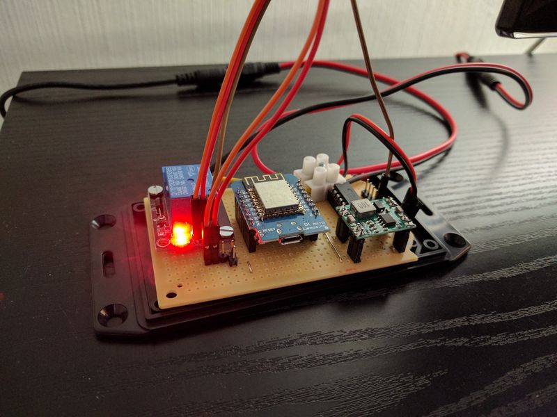 Wires connected to PCB with relay, Wemos and step-down converter