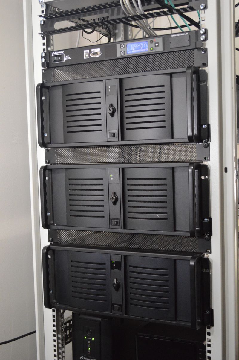 Three servers and UPS in computer rack