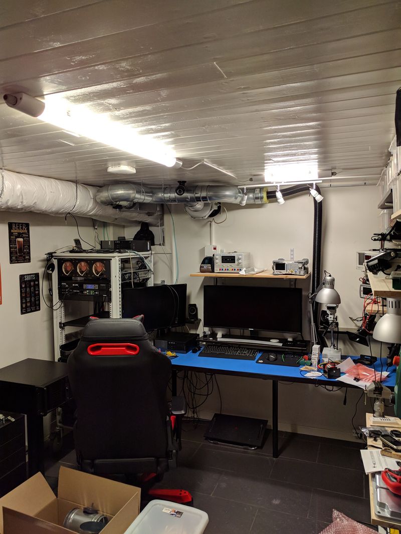 Man cave/home office, with homelab, desk, and LED lights in the ceiling