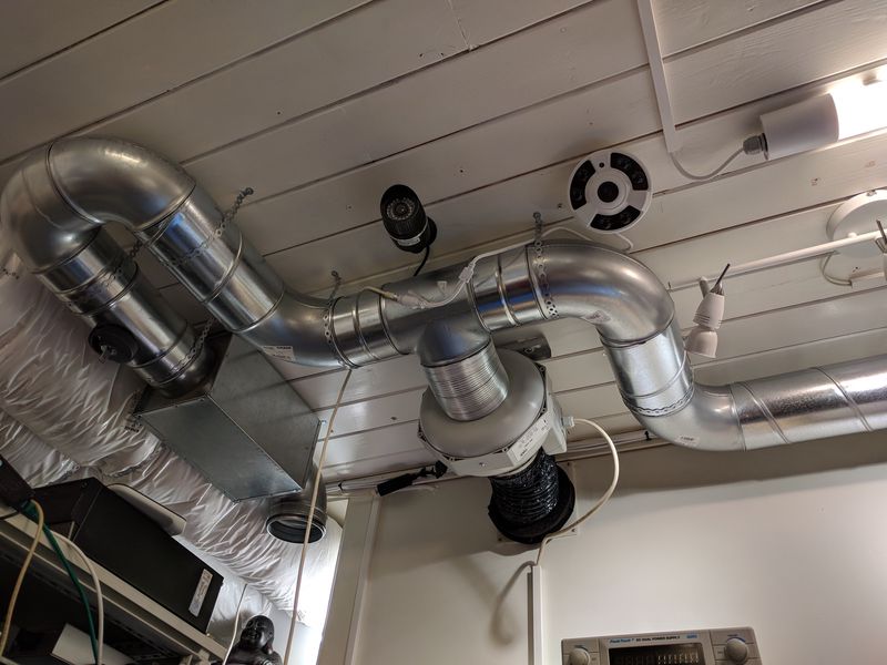 Exhaust ventilation system, with valve, duct fan, noise trap, and ceiling intake