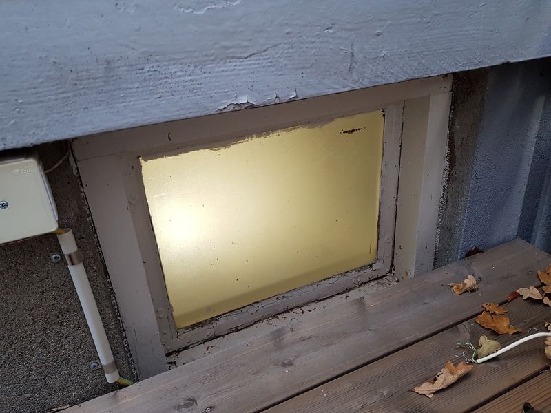 Basement window, seen from outside