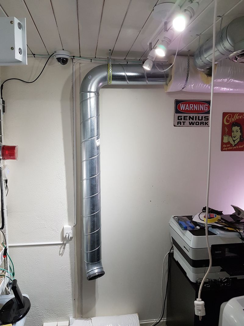 Spiral duct mounted vertically on wall