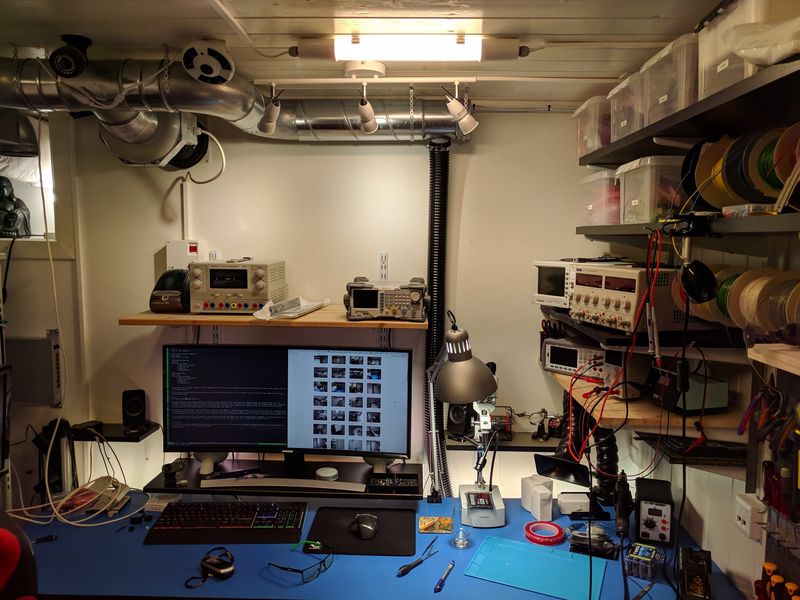 Electronics lab, with ultrawide monitor, instruments, tools and fume extraction system