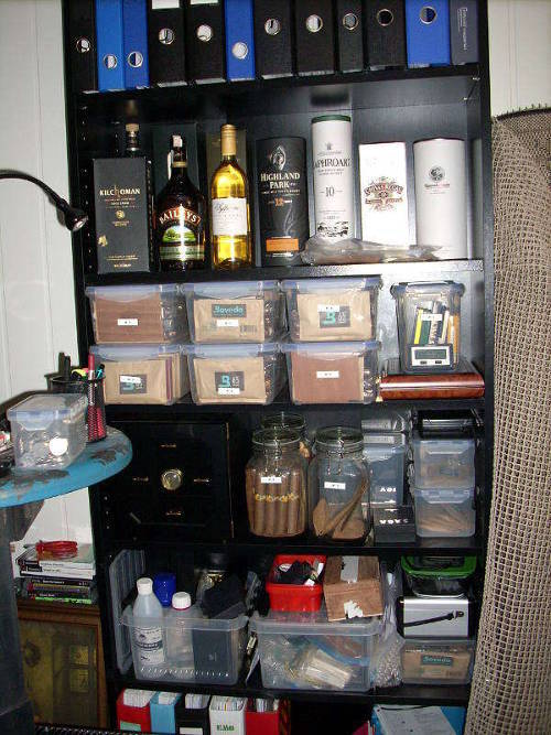 Shelves with whisky and cigars, in my old home office