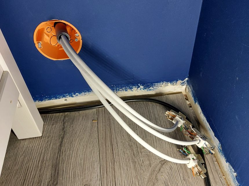 Running three CAT6 cables to the living room TV bench