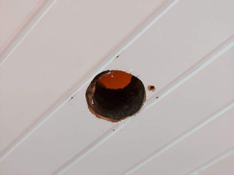 125 mm hole in bathroom ceiling