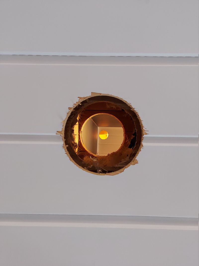 Hole in 1st floor living room ceiling