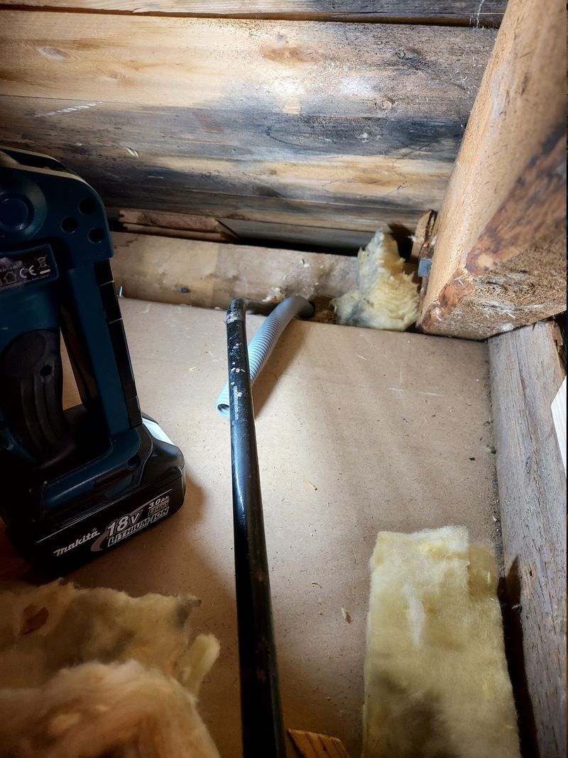 Piece of flexible conduit in the attic
