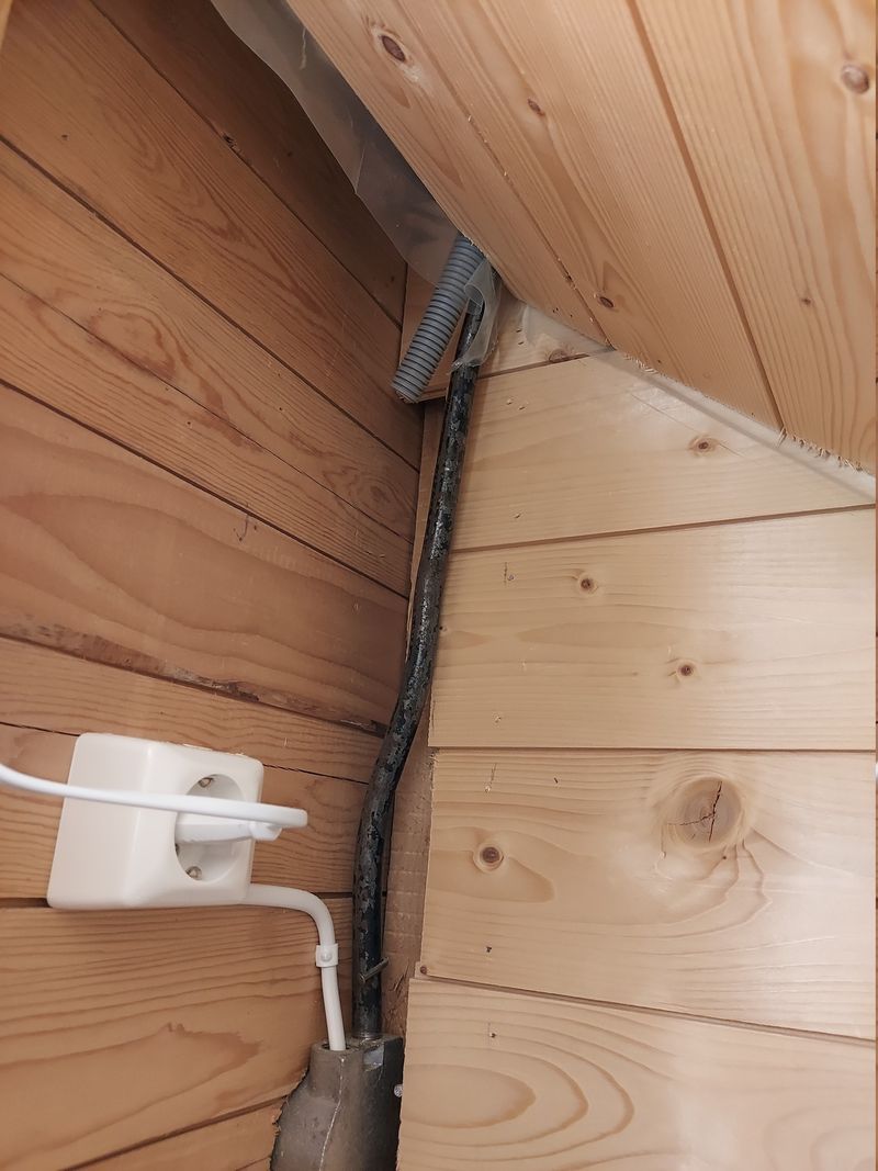 Flexible conduit pulled into 2nd floor closet