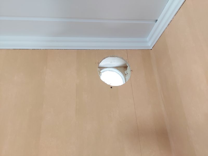 Hole in wall between laundry room and play room