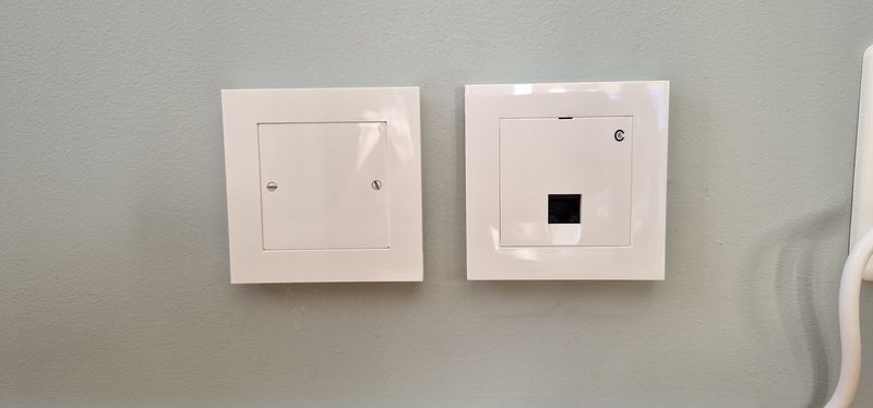 Network wall outlet, next to blanking cover