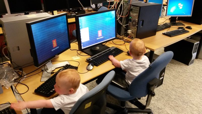 My twin boys, using computers, at my work in 2015